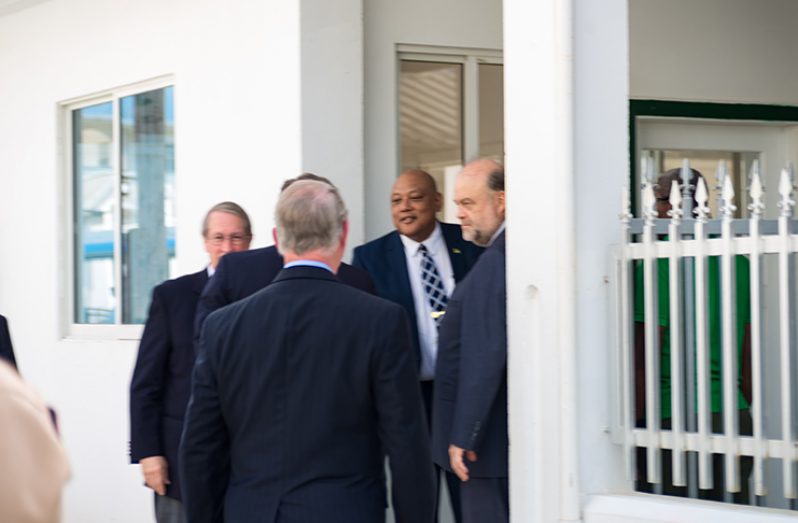 U.S. Ambassador Perry Holloway introducing Natural Resources Minister Raphael Trotman to members of the U.S. delegation.