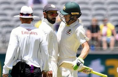 Virat Kohli (left) and Tim Paine exchanged verbal volleys on Day 3 of the second Test between India and Australia.