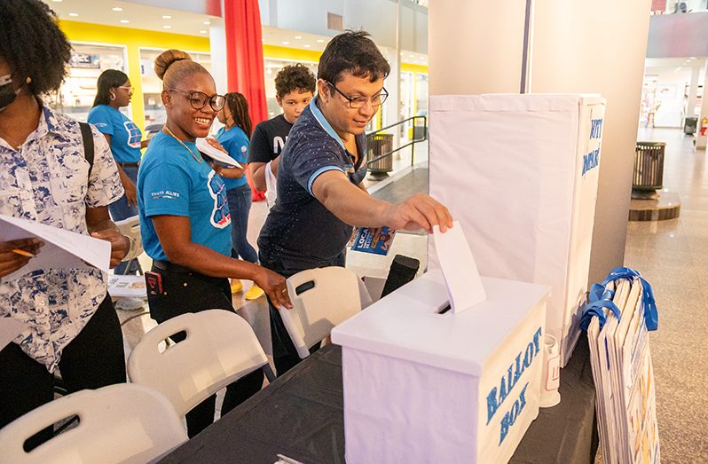 A mock polling station set up as one of the main components of the voter education campaign (Delano Williams photo)