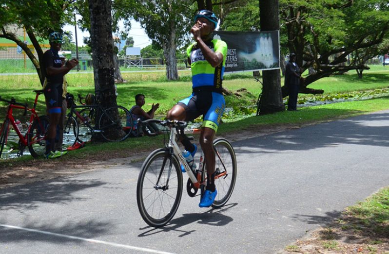 Unchallenged! Walter Grant-Stuart crosses the finish line without a challenger in sight to cop the inaugural Rainforest Waters cycling title.