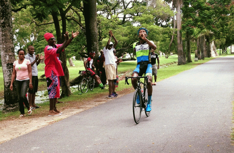 Walter Grant-Stuart crosses the finish line unchallenged to win the feature 35-lap event of the P&P Insurance 11-race cycling meet at the inner circuit of the National Park.