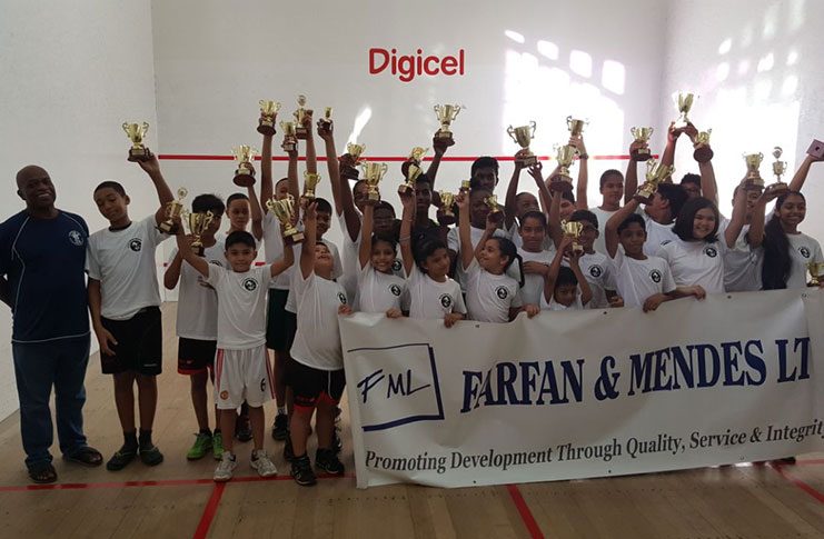 The respective winners of the Guyana Squash Association’s Farfan and Mendes Junior skill level tournament.