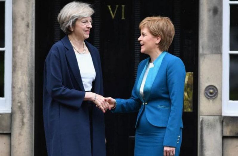 Theresa May, Prime Minister of the United Kingdom and
Leader of the Conservative Party with Nicola Sturgeon,
Prime Minister of Scotland and Leader of the Scottish
National Party (Getty Images)