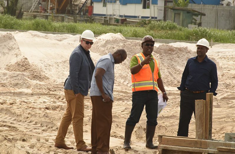 (L-R) GFF’s Technical Director Ian Greenwood, first VP Bruce Lovell, second VP Rawlston Adams and President Wayne Forde examining the on-going work on their ‘Training and Development Centre’