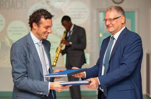 WWF Guianas’ Representative, Laurens Gomes and EU Ambassador for Guyana and Suriname, Jernej Videti, exchanging signed copies of the agreement at the Regency Suites