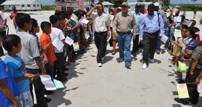 President Donald Ramotar and his delegation being accorded a warm welcome on arrival at Wakapau