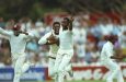 A jubilant Courtney Walsh celebrates the narrowest of victories  •  (Getty Images)