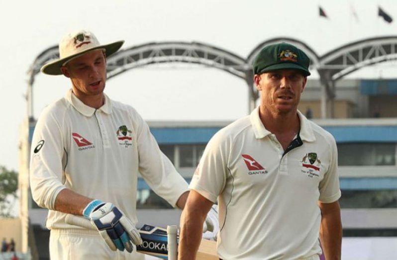 David Warner and Peter Handscomb add an unbroken 127 for the third wicket to help Australia trim the deficit to 80 at stumps on the second day.