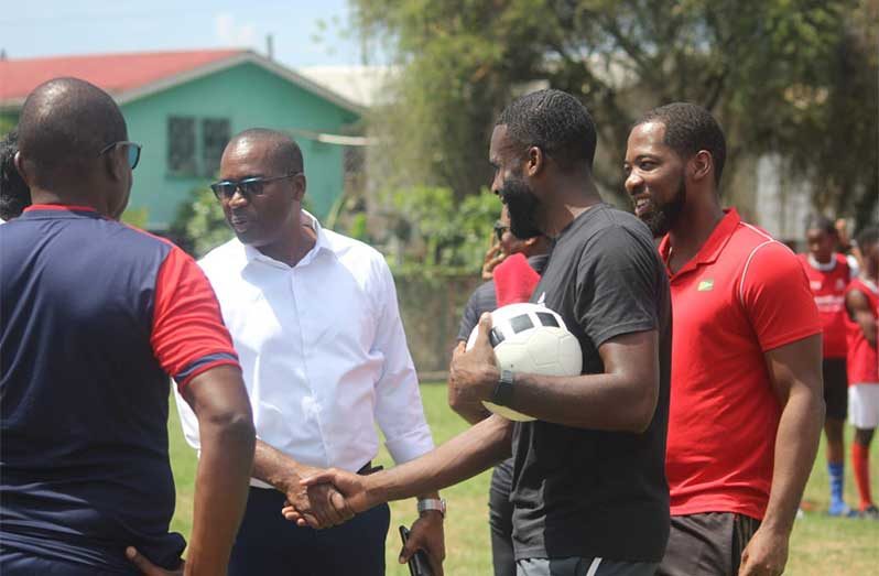 GFF President Wayne Forde (left), footballer Jeremy Garrett and national table tennis player Shemar Britton at one of the sessions 