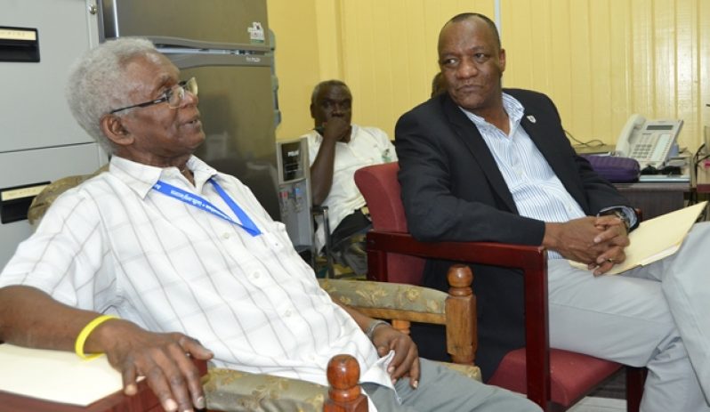 Minister of State, Joseph Harmon and Professor Clive Thomas