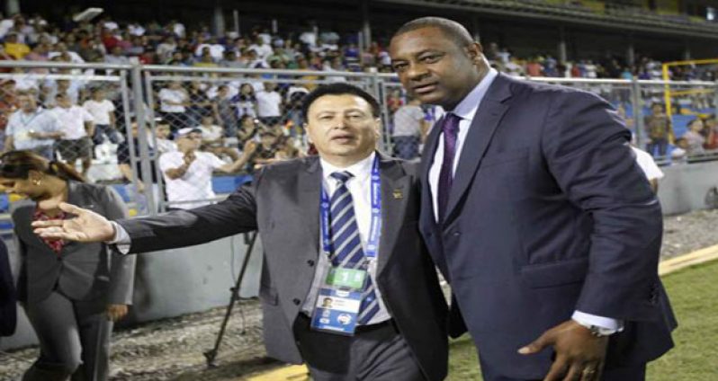 Recently installed CONCACAF president Alfredo Hawit (left) and former CONCACAF president Jeffrey Webb