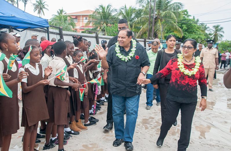 The schoolchildren brought out their little flags to accord the Prime Minister and his wife and other government officials a hearty welcome to Den Amstel on Wednesday