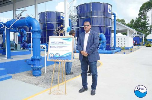 Minister of Housing and Water, Collin Croal, stands in front of the state-of-the-art Caledonia Water Treatment Plant that marks a significant step in improving access to clean, reliable water for thousands of residents