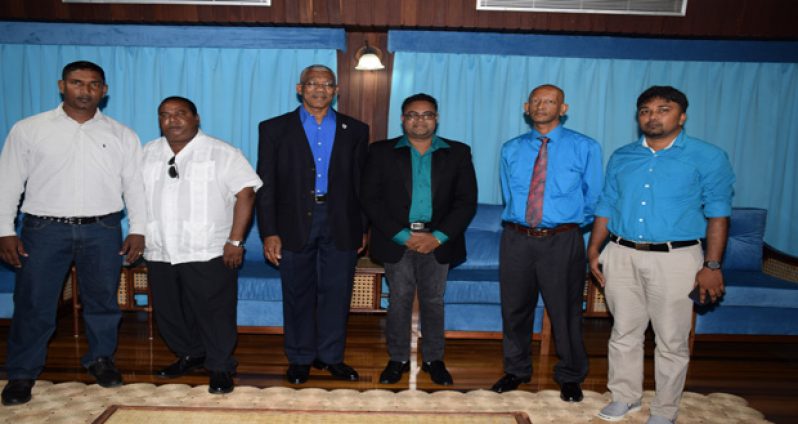 President David Granger (third left) with members of the West Berbice Chamber of Commerce- They are, from left: Tage Singh, Dr. Alexander Sinclair, Imran Saccoor, Pradeep Bachan and Hardat Malchand