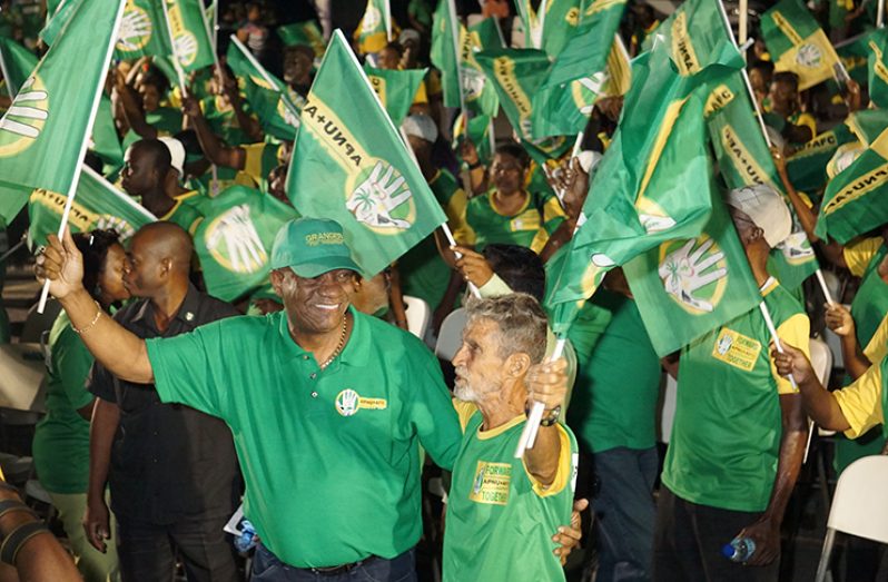 Director-General of the Ministry of the
Presidency, and General Secretary of
the A Partnership for National Unity
(APNU), Joseph Harmon celebrates
the achievements of the David Granger
Administration with residents of West
Bank Demerara as they predict another
win at the March 2 General and
Regional Elections. (Elvin Croker photo)