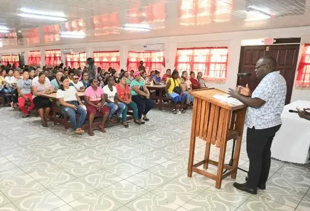 Minister within the Office of the Prime Minister with responsibility for Public Affairs, Kwame McCoy addresses pathway workers at Kuru Kuru Training College