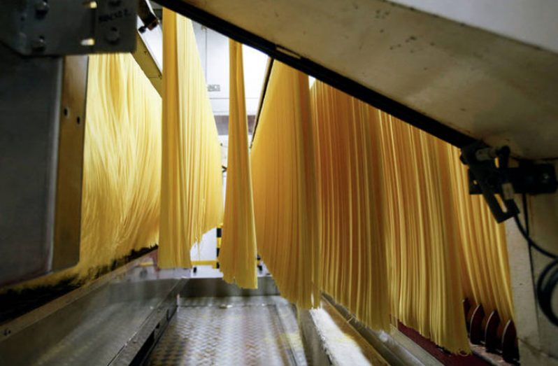 Making spaghetti from durum wheat in Italy