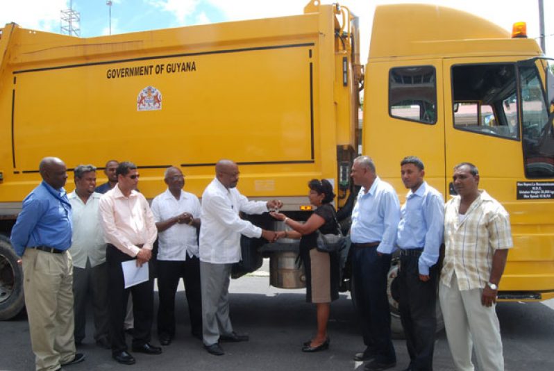 The ceremonial handing over of the multi-million-dollar compactor truck yesterday.