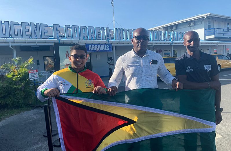 Federation President Franklin Wilson with Romeo Hunter (left) and Franklyn Brisport-Luke (right) on Monday afternoon.