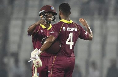 West Indies cricketer Shai Hope (R) hugs his teammate Keemo Paul (L) after winning the second one-day international (ODI) between Bangladesh and West Indies.