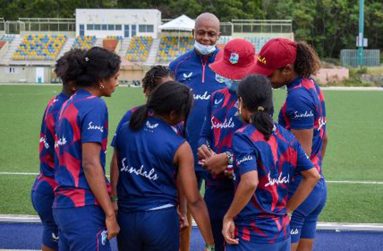 Head coach Courtney Walsh (background) with players during the training camp in Johannesburg