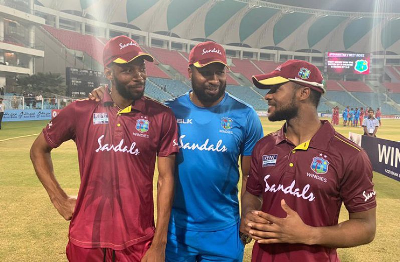 Kieron Pollard poses with Man-of-the-Series Roston Chase (left) and Man-of-the-Match Shai Hope (right).