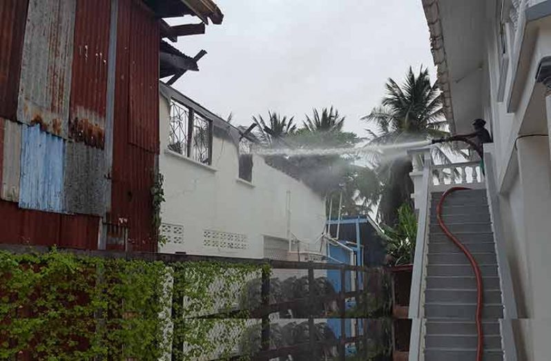 A firefighter trying to put out the flames at the Windsor Castle home