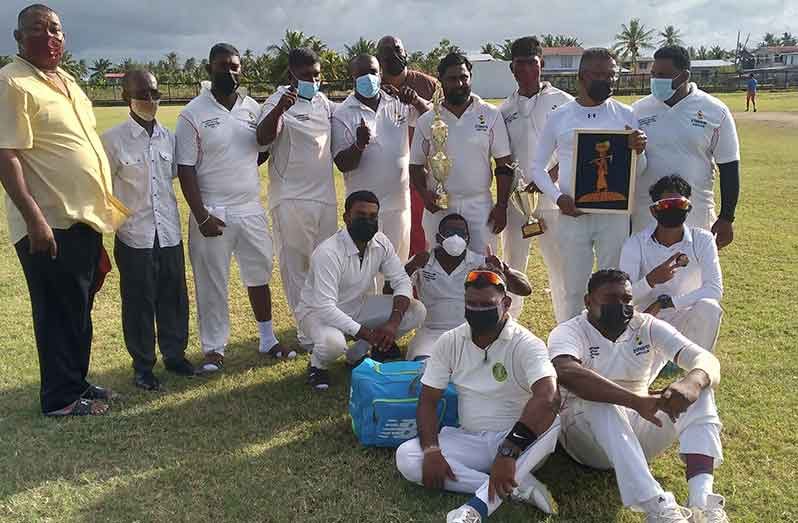 The winning team pose with BCB president Hilbert Foster and sponsor MP Faizal Jafferally