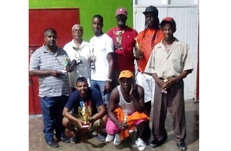 The various winners of last Sunday’s competition Khemraj Pooranmall, is stooping (left) while Devanand Persaud is standing second from left.