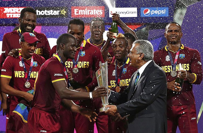 FLASHBACK: West Indies captain Darren Sammy (third left) receives the  World Cup T20 trophy in 2016 from Zaheer Abbas (right), President of ICC, after they won the final.©REUTERS / Action Images
