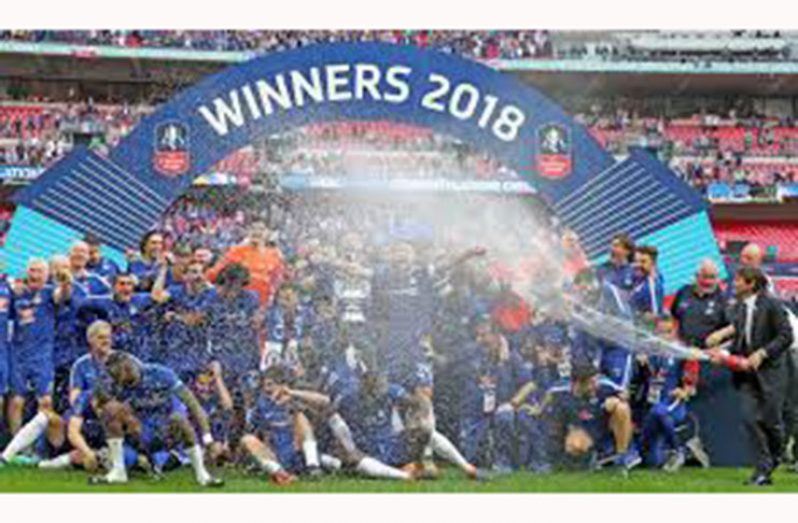 Wembley Stadium, London, Britain - May 19, 2018. Chelsea manager Antonio Conte sprays champagne as they celebrate victory. (REUTERS/David Klein/File photo)