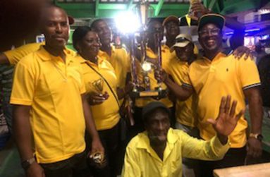 The winners of the Linden Town Week Dewars dominoes tournament
