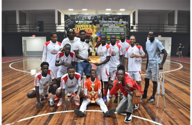 Bent St A (white) receives the championship trophy after defeating Back Circle in the final