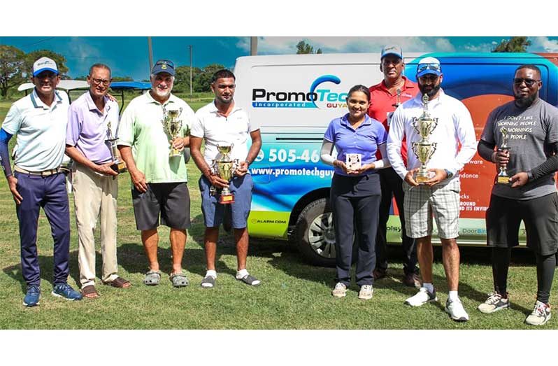 The winners row for the PromoTech Golf Tournament