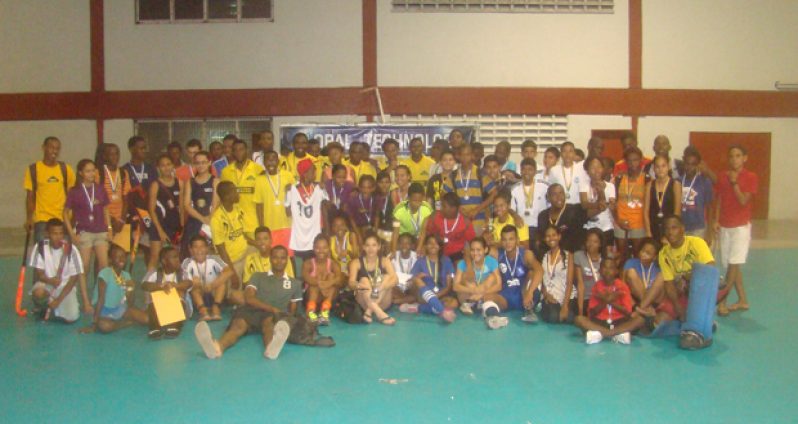 The winning teams of the various categories of the Hikers Hockey Club’s Junior Indoor tournament in a photo opportunity after Sunday’s finals which were staged at the National Gymnasium.