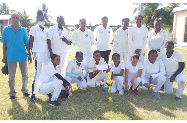 The winning RHT Metro team pose with their championship trophy.