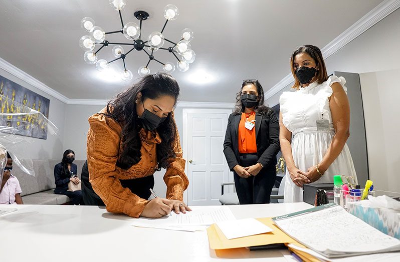 First Lady, Arya Ali and representatives of Tails of Hope sign an agreement for the use of the mobile unit which was donated (Office of the First Lady photo)