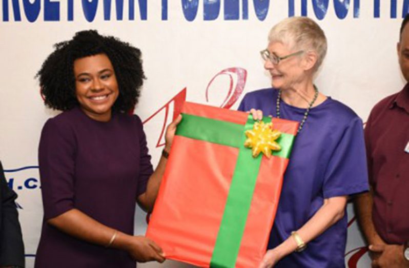 Chair of the Georgetown Public Hospital Corporation (GPHC) Board, Kesaundra Alves, presenting a small token of appreciation to the Australian High Commission’s First Secretary and Consul, Susan Ulrich