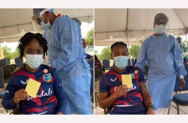Two West Indies Women cricketers display their COVID-19 vaccination cards after taking the jab in Antigua. (Photos: CWI Media)