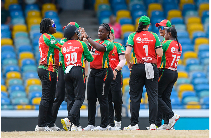 The Guyana Amazon Warriors women celebrate a wicket