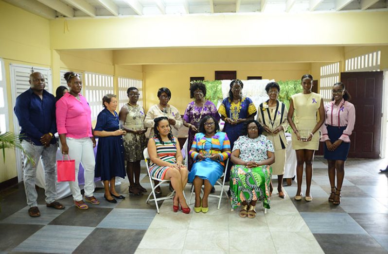 Some of the women that were awarded by the East Coast District National Congress of Women for their contributions to society. Seated from left are: Regional Executive Officer, Region Four, Pauline Lucas; Minister of Foreign Affairs, Dr Karen Cummings; Regional Chairman Region Four, Genevieve Allen