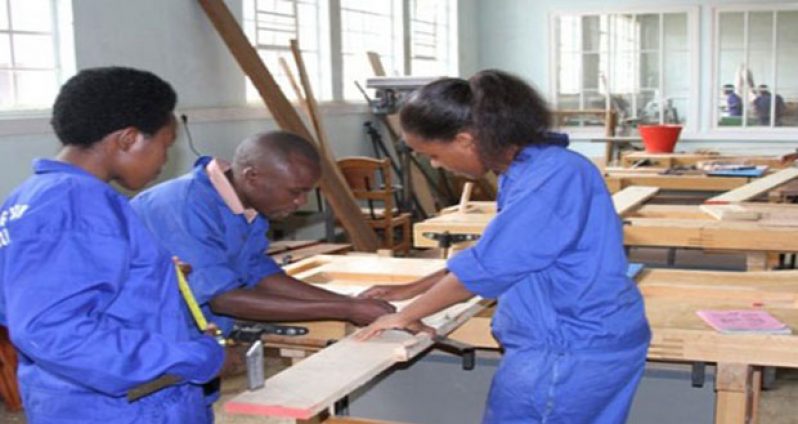 Woodworking (Students in the woodworking class of the Georgetown Technical Institute (GTI) practicing their skill)