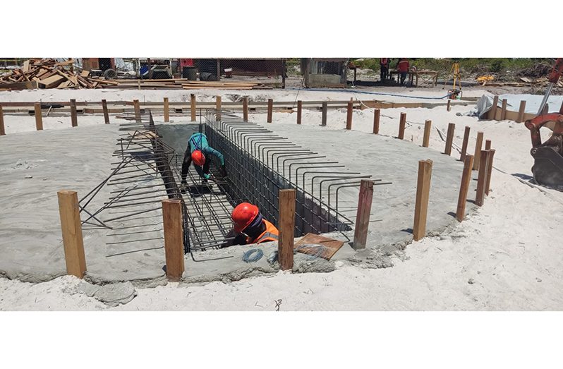 Men busy at work at the Onderneeming project site