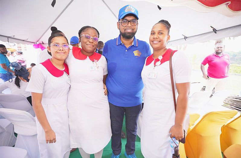 President, Dr Irfaan Ali with the healthcare workers in Region Ten (Office of the President photo)