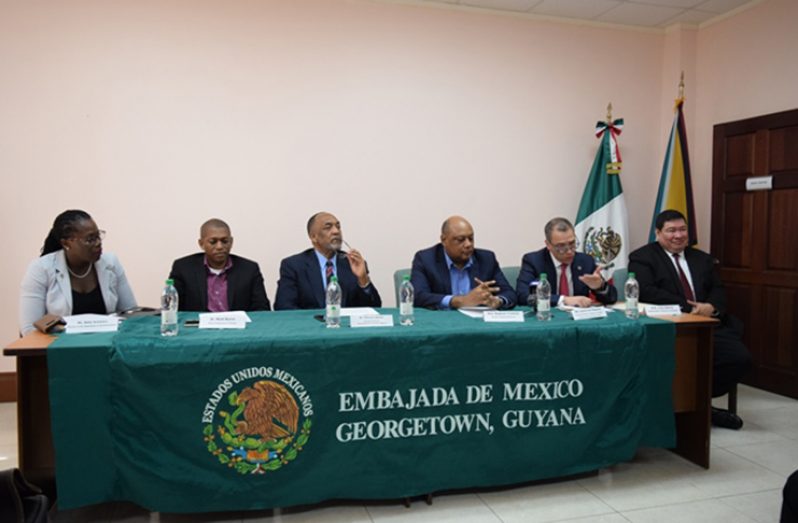 Minister of Natural Resources Raphael Trotman flanked by Government Officials and Representatives from the Embassy of Mexico