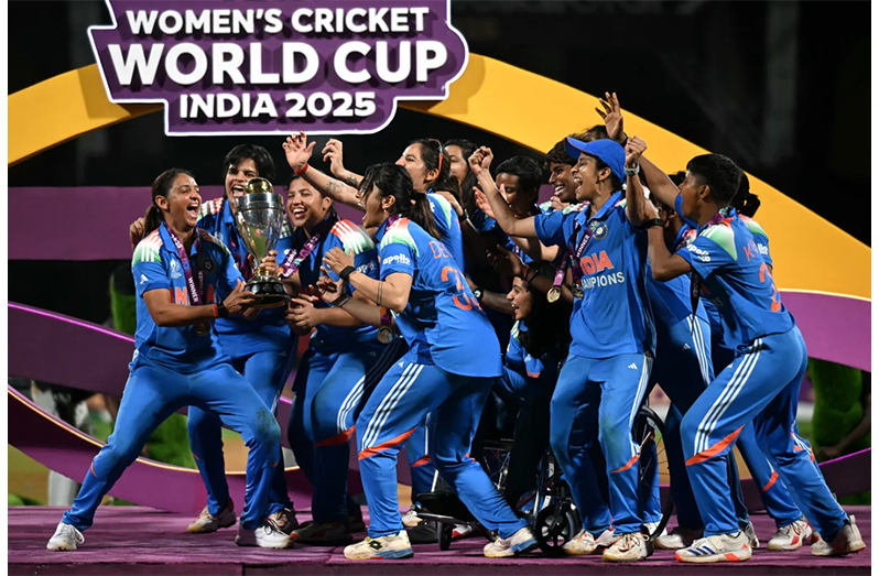 The Indian team lifts the World Cup Trophy  •  (ICC/Getty Images)
