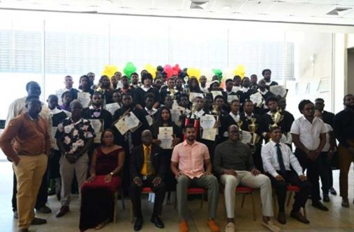 Minister of Culture, Youth and Sport, Charles Ramson Jr; Minster within the Ministry of Culture, Youth and Sport, Steven Jacobs; government officials and graduates from the YEST programme