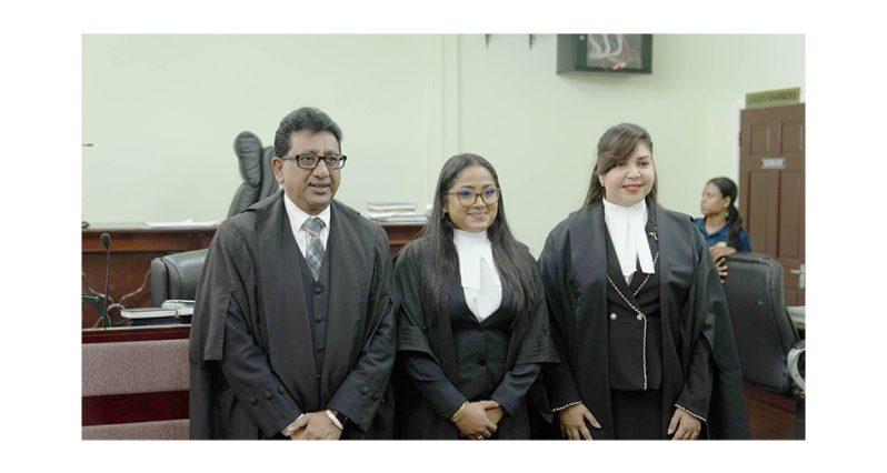 Newly-minted Attorney-at-Law, Yashoda Samaroo (centre) flanked by Madam Justice Kumar-Chetty at the High Court and Attorney General and Minister of Legal Affairs, Mohabir Anil Nandlall, SC, MP, who appeared on her behalf