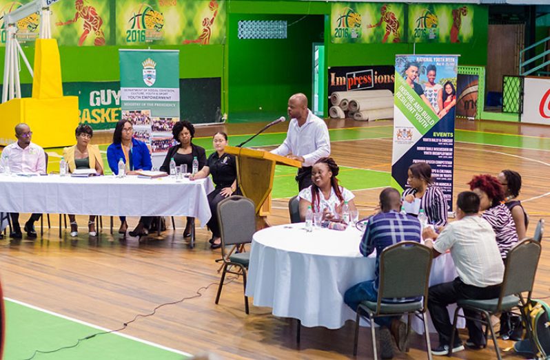 Youth Challenge Guyana (YCG) Executive Director, Dmitri Nicholson addressing the gathering