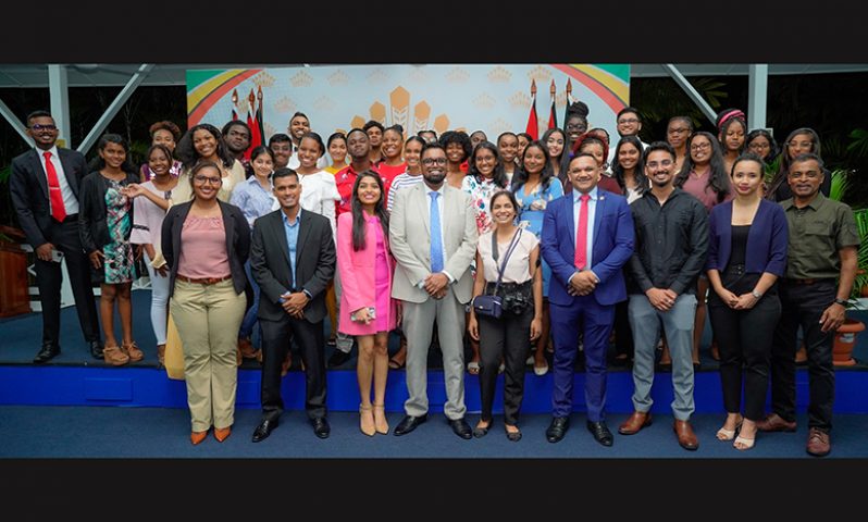 President, Dr Irfaan Ali (fourth from left in front row); Natural Resources Minister, Vickram Bharrat (fourth from right in front row), and Parliamentarian Dharamkumar Seeraj (first from right) are joined by officials of the Natural Resources Ministry and this year’s Youth in Natural Resources Apprentices (Office of the President photo)